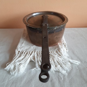 ancient copper pot with lid Italy