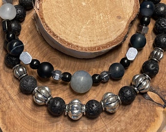 Black Lava Stone beads with Silver Hematite. Gray and black glass beads. Elastic bracelets.