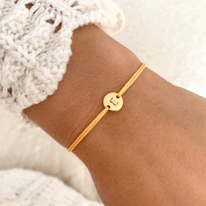 Pulseira redonda com pingente personalizado