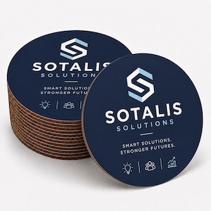 May include: A stack of round cork coasters with a dark blue top surface. The design features a white geometric S logo, the text SOTALIS SOLUTIONS, the phrase SMART SOLUTIONS. STRONGER FUTURES., and three small white icons of a lightbulb, people, and a graph.