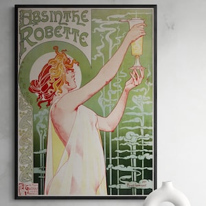 May include: A vintage poster advertising Absinthe Robette, a brand of absinthe. The poster features a woman in a flowing white dress, holding a glass of absinthe. The background is a green and white pattern.