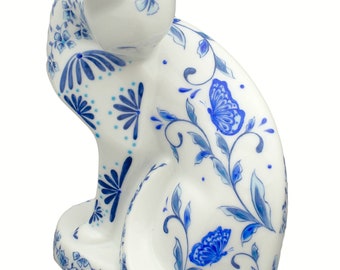 Porcelain cat figurine hand painted with azure blue flowers