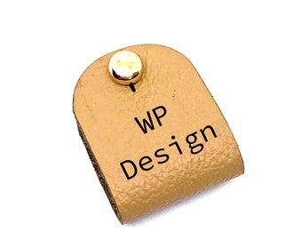 10 labels semi-circular 22 x 64 mm with rivet, logo/desired text made of leather in 15 colours