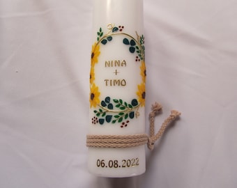 Wedding candle with sunflowers