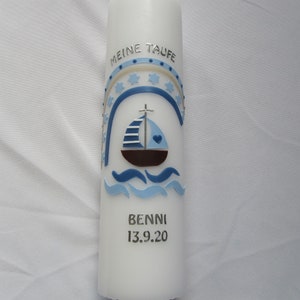 Baptism candle with boat and rainbow