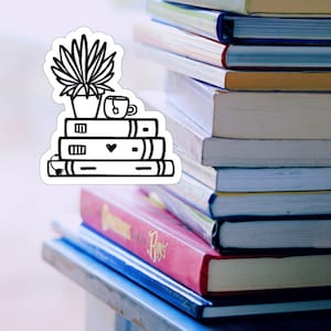 May include: A black and white illustration of a stack of books with a potted plant and a cup of tea on top. The illustration is on a white background.