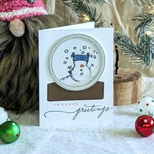 Cartão interativo de boneco de neve | Globo de neve do país das maravilhas do inverno | Cartão de Natal feito à mão com boneco de neve | Cartões de felicitações de Natal exclusivos