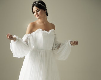 white fluffy wedding dress