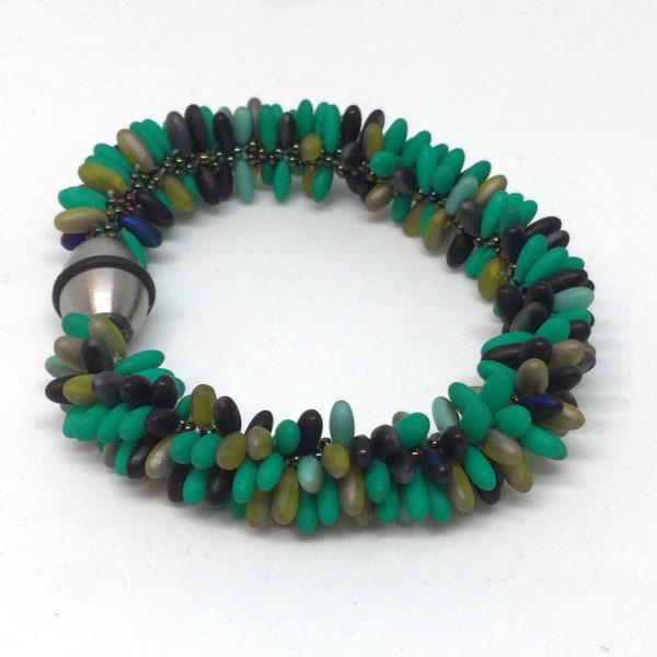 Rainforest colors in woven beaded bracelet