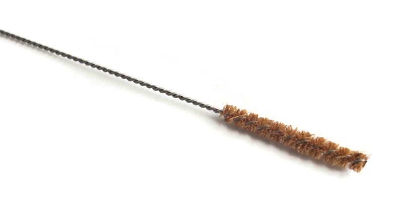 May include: A long, thin cleaning brush with a brown bristle head and a silver wire handle.