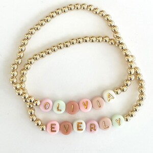 Handmade Name Bracelet Gold Beaded Style Personalized Gift Option Custom Design Jewelry Special Mom Present Birthday Celebration Accessory Mother Day Gift Idea Acrylic Letter Details Stretch Band Comfort Adjustable Size Elegant Wrist Wear