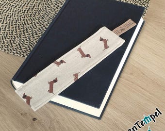 "Dachshund" fabric bookmark with cute dachshund motifs. Gift or souvenir for book lovers and dachshund fans.
