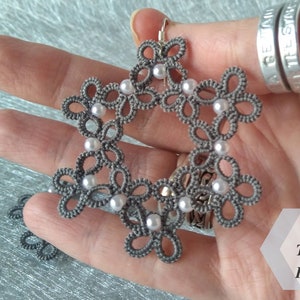 May include: Grey tatting earrings with white beads, shaped like a star. PDF Tatting Pattern.