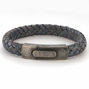 Atrophy Blue ROXCS branded Hidden Message Leather Bracelet for men, & a Vintage style Front Button Steel Clasp. From the &quot;Dirty Vegas&quot; range