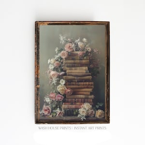 May include: A stack of vintage books with a floral arrangement of pink, white, and cream roses, and greenery. The books are arranged in a tower with the flowers cascading down the sides. The background is a soft, muted green.