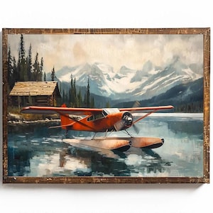 May include: A vintage-style painting of a red seaplane landing on a lake in front of a mountain range. The plane has floats and is surrounded by water. The mountains are snow-capped and the sky is blue.
