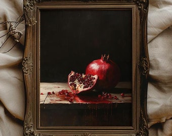 May include: A framed painting of a still life featuring a halved pomegranate with red seeds and a whole pomegranate on a wooden table. The pomegranate is dripping red juice onto the table.
