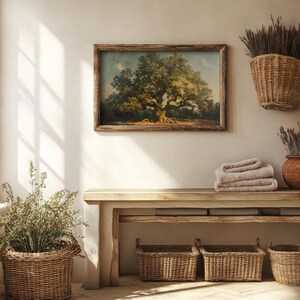 May include: A rustic wooden bench with four woven baskets underneath. The bench is against a white wall with a framed painting of a large tree and dried flowers in a woven basket hanging on the wall.