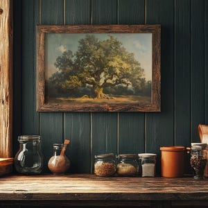 May include: A framed painting depicting a large oak tree with green leaves in a woodland setting. The painting is hung on a dark green wall with wood panelling. Several glass jars and a ceramic jar are arranged on a wooden shelf below the painting.