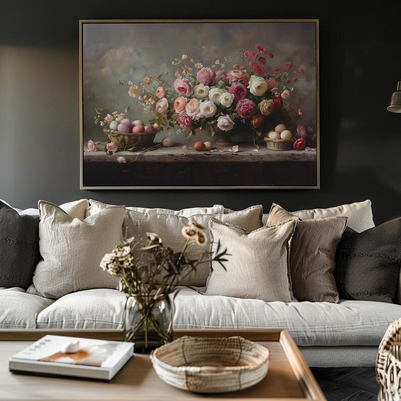 May include: A framed painting of a still life featuring a bouquet of pink and white roses in a vase, with a bowl of eggs on a table in front of the flowers.