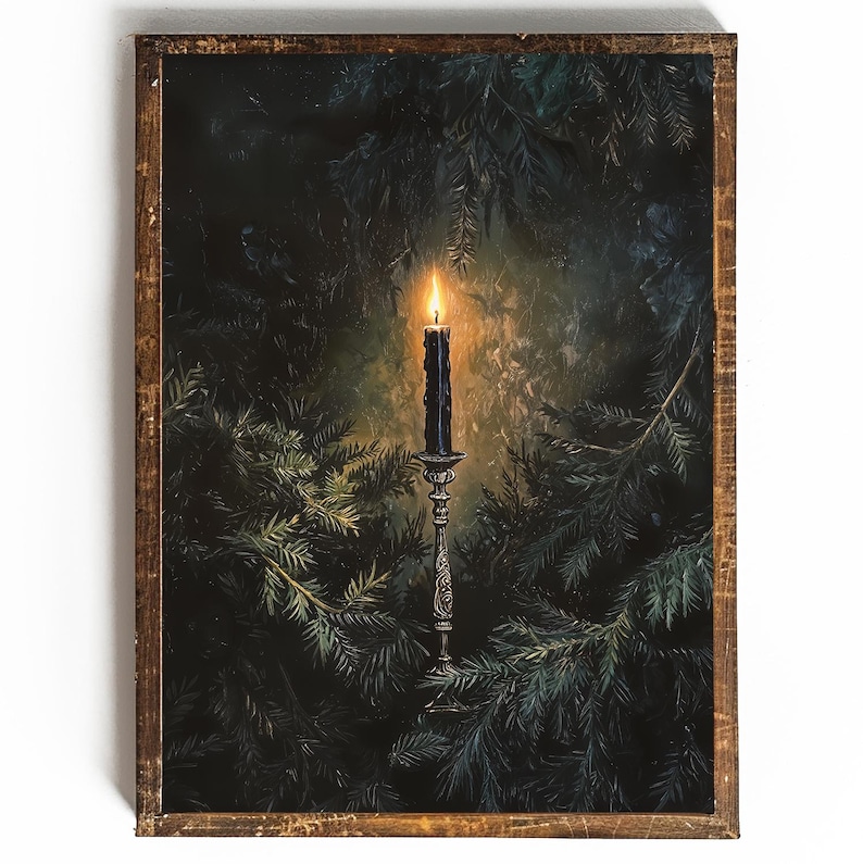 May include: A black candle burning brightly on a silver candlestick, surrounded by dark green pine branches.