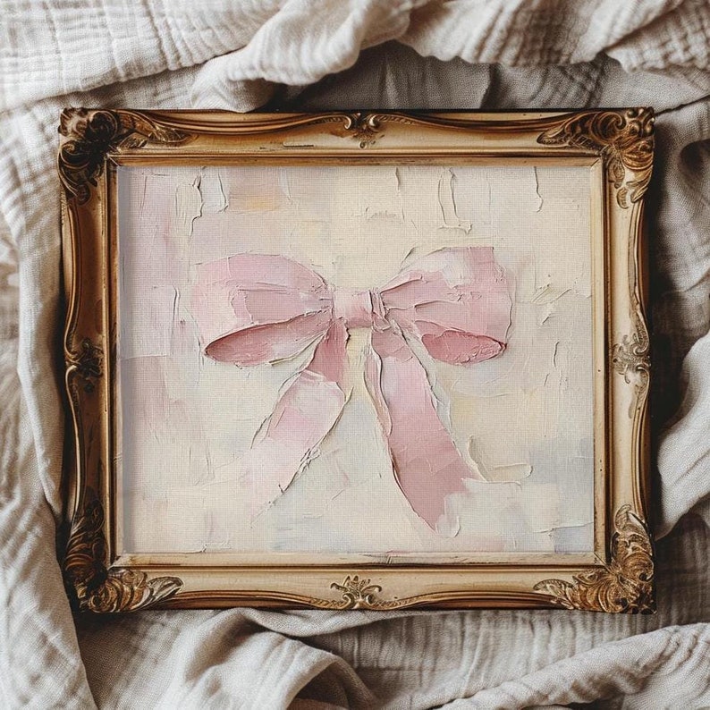 May include: A framed painting of a pink bow on a white background. The bow is painted in a textured style, giving it a three-dimensional look.