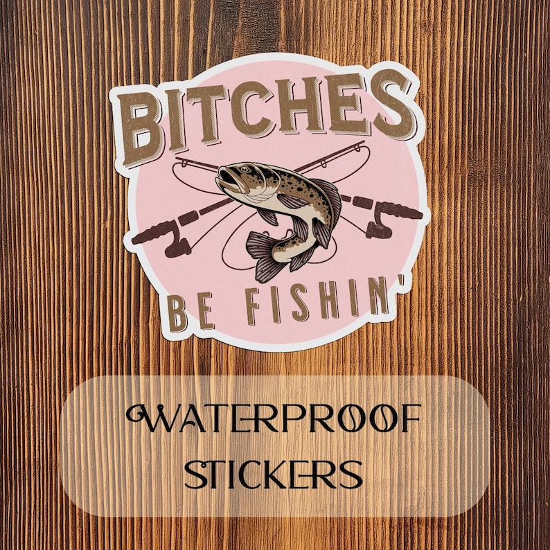 May include: Pink and brown waterproof sticker with a fish and the text "Bitches Be Fishin'"