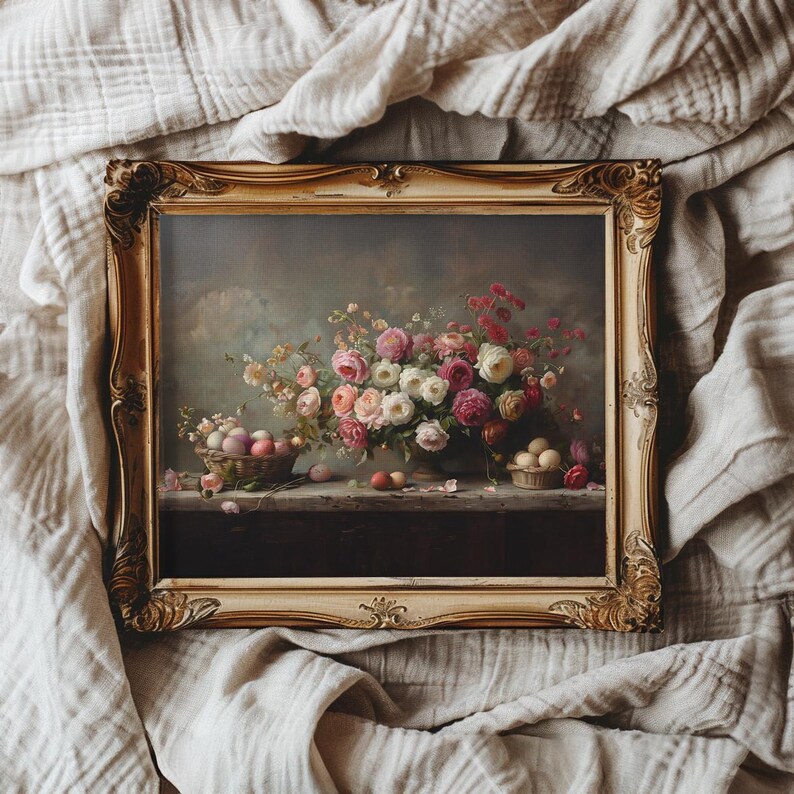 May include: A vintage-style framed painting of a still life featuring a bouquet of pink, white, and red roses in a vase. The roses are arranged on a table with a basket of eggs and a few scattered eggs.