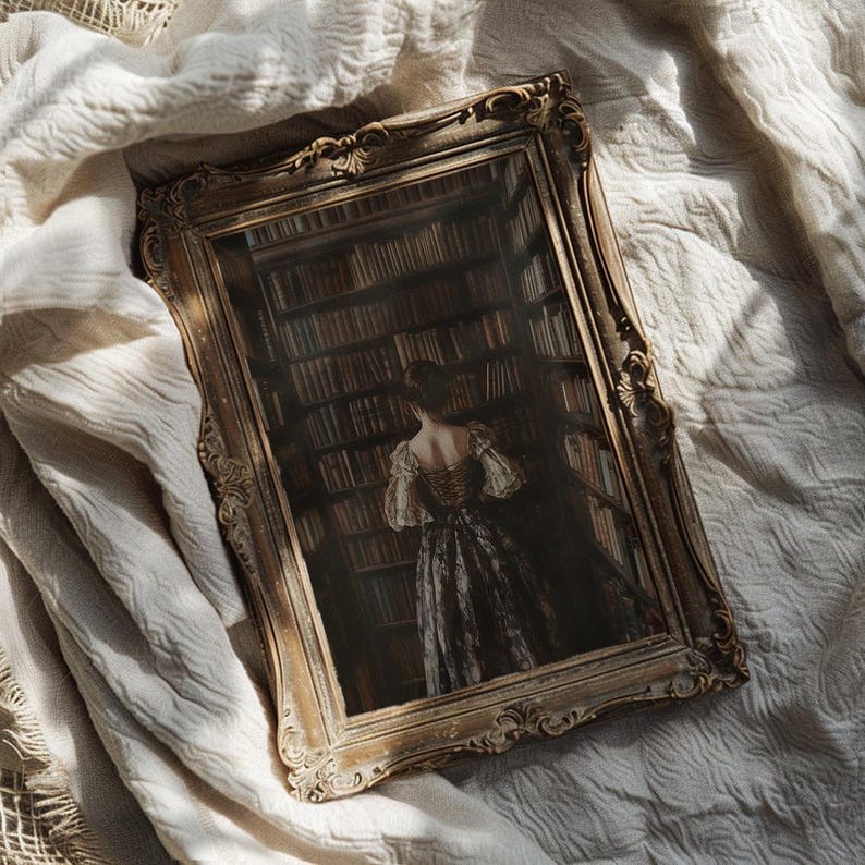 May include: A framed photograph of a woman in a long, dark dress standing in front of a bookshelf filled with books. The frame is ornate and gold in color.