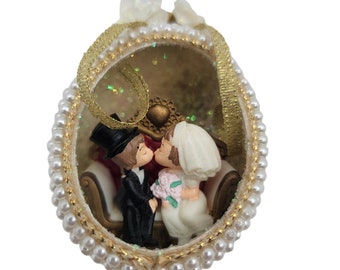 Vintage egg wedding diorama with pearls