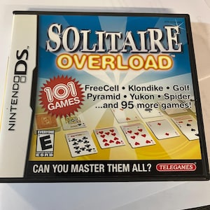May include: Solitaire Overload game cartridge for Nintendo DS. The game case features a blue and white background with the game title in large, bold letters. The cover advertises 101 games, including FreeCell, Klondike, and Spider.