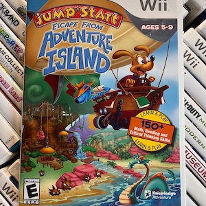 May include: A white ceramic mug with a black handle and the text "But First, Coffee" in a bold, black font. The mug is sitting on a wooden surface. The mug is approximately 4 inches tall.