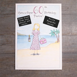 May include: A hand-drawn birthday card with the text "Have a Super 60th Birthday Paula!" A woman in a pink polka-dot dress stands on a beach holding a bottle and purse. The card includes the text "Hand drawn from your photos and ideas!" and "Fully Bespoke Cards."