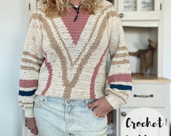 May include: Crochet pattern for a sweater with a geometric design in beige, pink, and blue. The sweater has long sleeves and a crew neck.