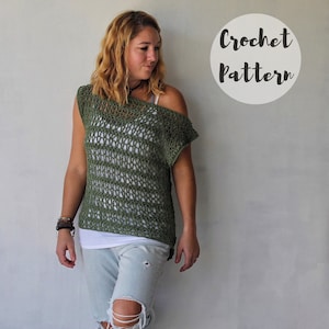 May include: A green crochet top with a loose, open-weave design. The top has a wide, off-the-shoulder neckline and short sleeves. The text "Crochet Pattern" is written in a circle in the upper right corner of the image.