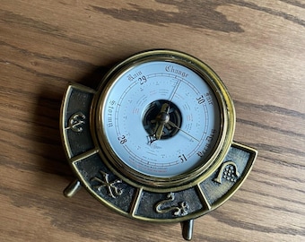 Barómetro antiguo de latón, de pie, con símbolos alquímicos, fabricado en Inglaterra.