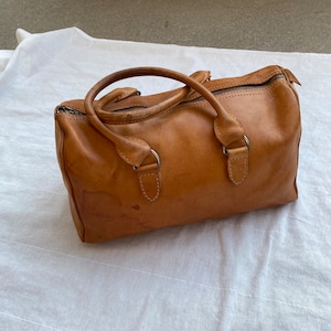 Vintage brown leather small duffle bag