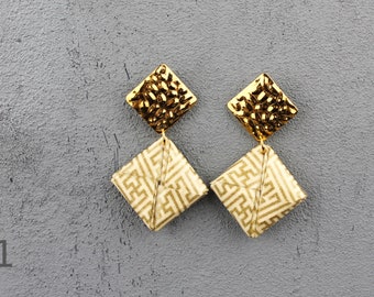 Design ear studs "squares"; in black, white and gold; paper, waterproof
