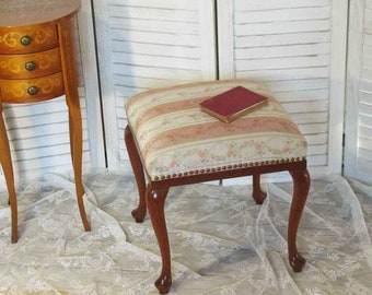 enchanting upholstered stool, old stool upholstered; charming old foot stool upholstered; Living room, country house, cottage, winter garden