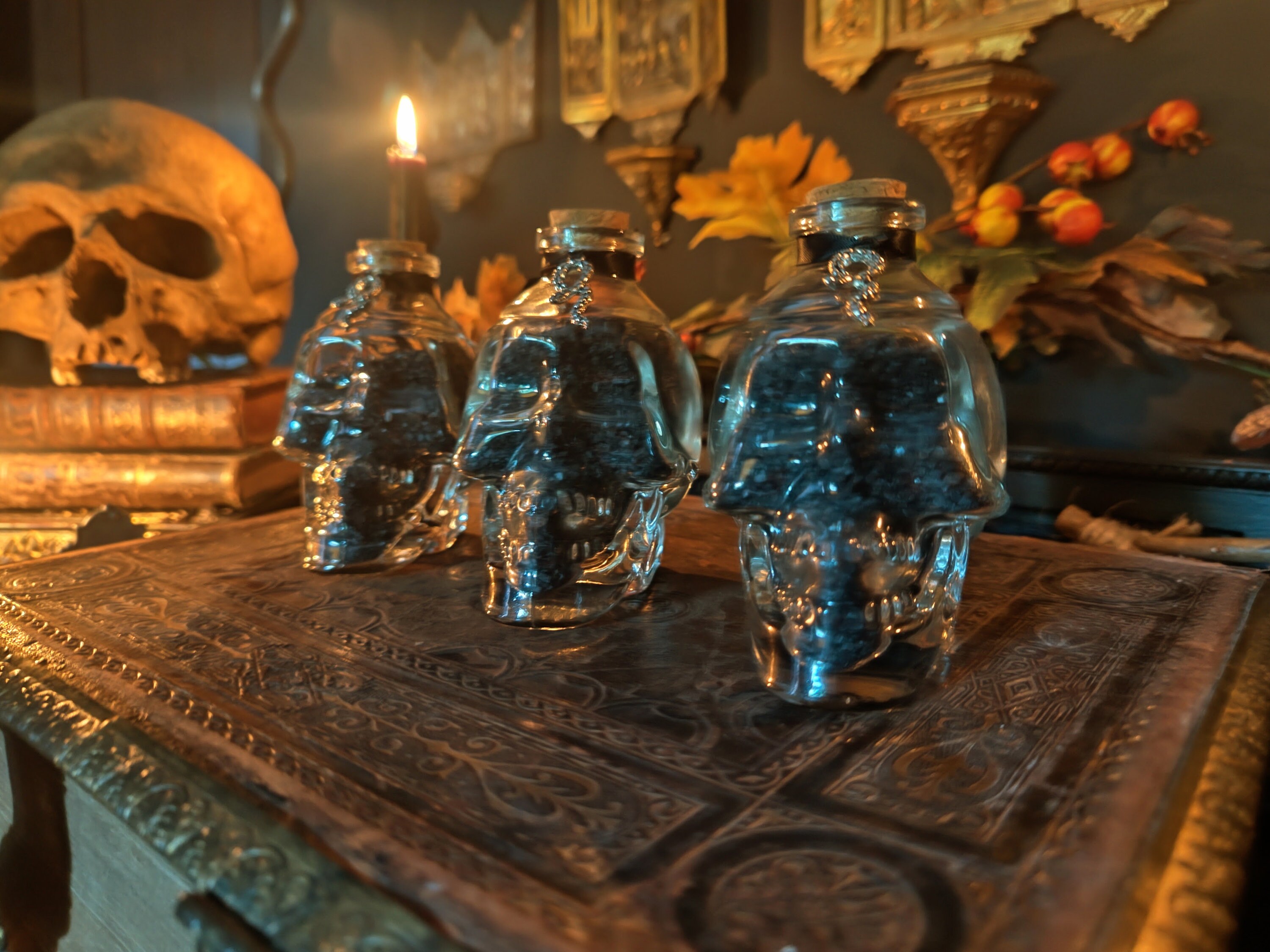 Cool Glass SKULL Altar bottles filled with Lucifer's Brand finest blend of Witches Black Salt!