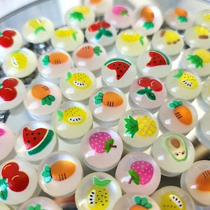 10 pieces of 12 mm acrylic cabochon, in pairs if desired.