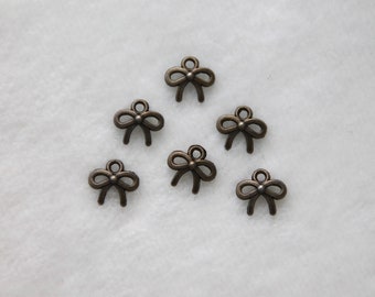 6 pcs. pendentif « arc », couleur bronze, 10 x 10 mm