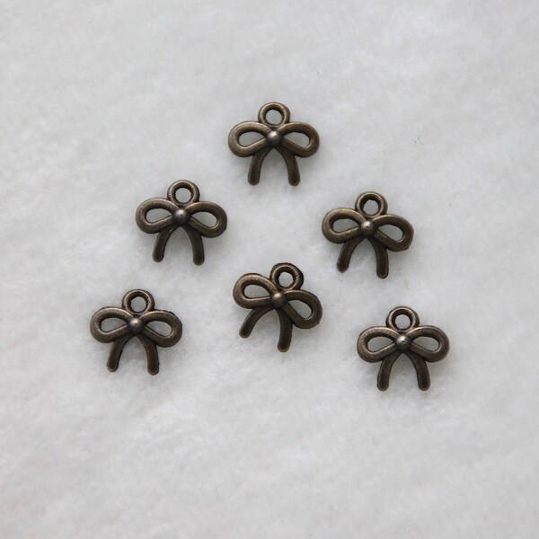 6 pcs. pendentif « arc », couleur bronze, 10 x 10 mm