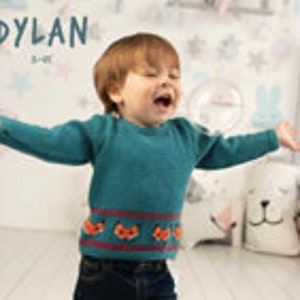 May include: A teal blue knitted jumper with a red and orange fox design on the bottom. The jumper is for a child and has the text "DYLAN 1-2" on the top.