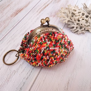 Vendedor ucraniano, porta-chaves multicolorido com fecho de beijo, porta-fones de ouvido de crochê