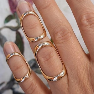 Fingerskena justerbar brons, ett stycke