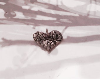 Sterling silver heart pendant with flowers