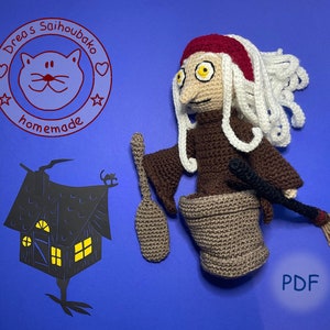 Könnte beinhalten: Häkelanleitung für eine Hexenpuppe mit Besen, Kessel und Haus. Das Muster ist als PDF-Download erhältlich. Das Muster ist von Drea's Saihoubako Homemade.