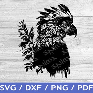 May include: Black and white silhouette of a parrot with a leafy branch behind it. The parrot's head is turned to the side, and its beak is open. The image has a paint splatter effect.