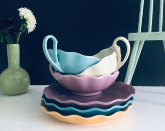 3 Tassen mit Untertasse Vintag pastell gewllt lila gelb türkis Design Collection